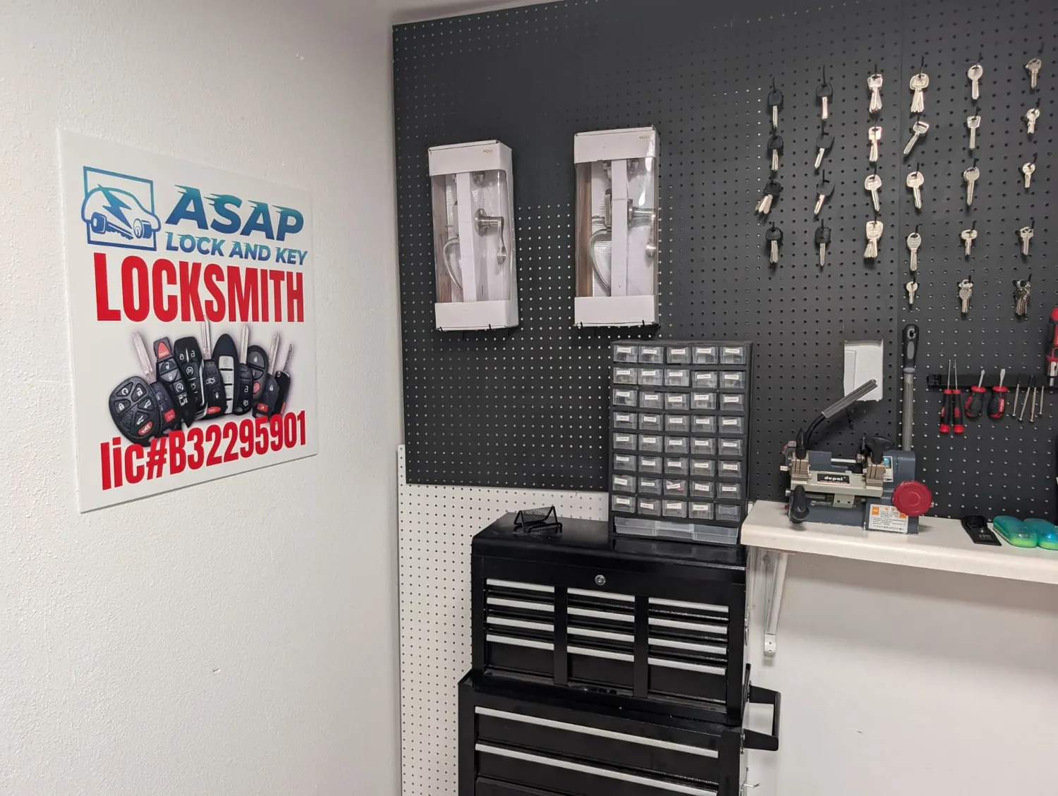 Key cutting station with key blanks and locksmith tools